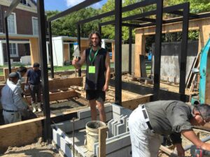 Construction workers building the Mandala Moon Gate Garden at Gardening World Cup in Nagasaki, Japan