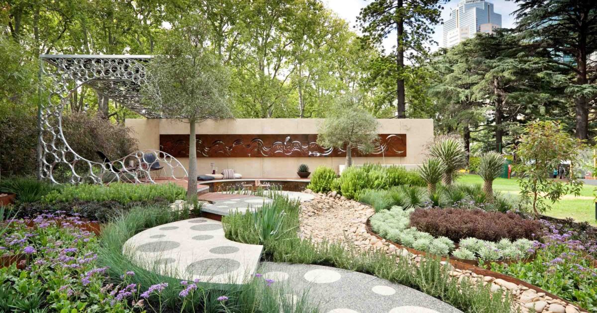 Contemporary garden with flowing curved pavilion, native plantings and sculptural screens at Carlton, Victoria