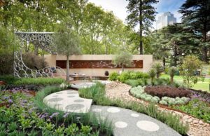 Contemporary garden with flowing curved pavilion, native plantings and sculptural screens at Carlton, Victoria