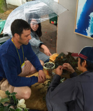 Visitors gathering for tea ceremony at We Heart Melbourne balcony garden exhibition in Nagasaki, Japan 2015